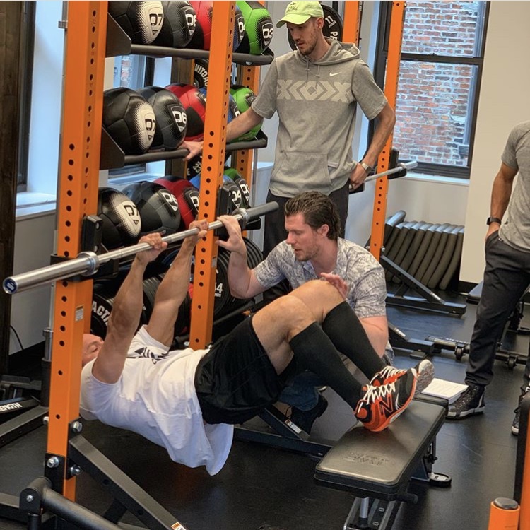 Strength training session inside the New York clinic