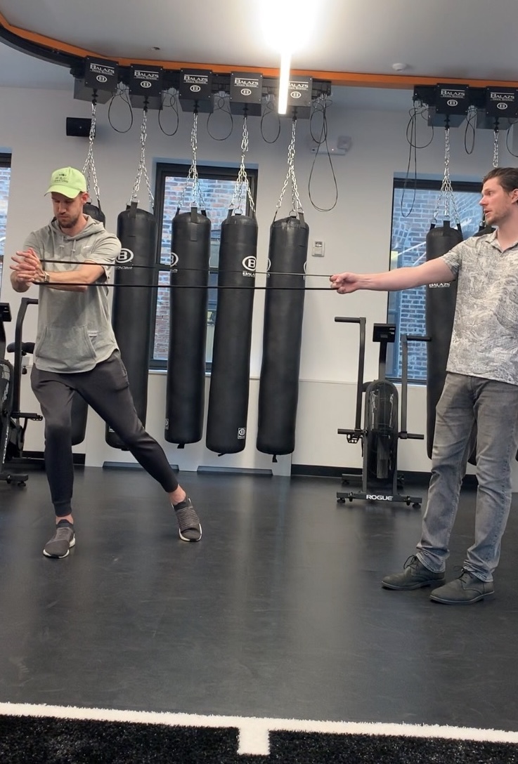 Resisted band drill retraining rotation and stance